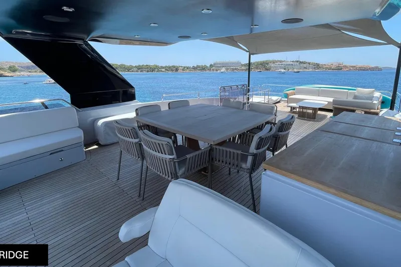  Yacht Photos Pics Luxurious 2023 Numarine 22 XP yacht deck with elegant seating and ocean view.