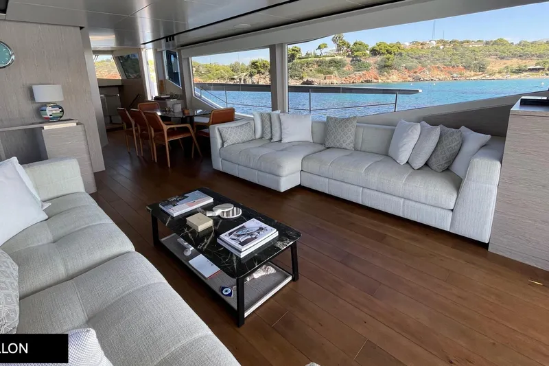  Yacht Photos Pics Luxurious interior of 2023 Numarine 22 XP yacht with elegant sofas and scenic ocean view.