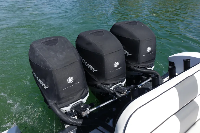 Shaka Yacht Photos Pics Triple Mercury outboard engines on a 2002 Fountain 38 CC Tournament Edition boat.