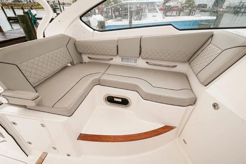 Silver Lining Yacht Photos Pics Luxurious seating on 2023 Pursuit DC 365 Dual Console boat, featuring elegant design and comfort.