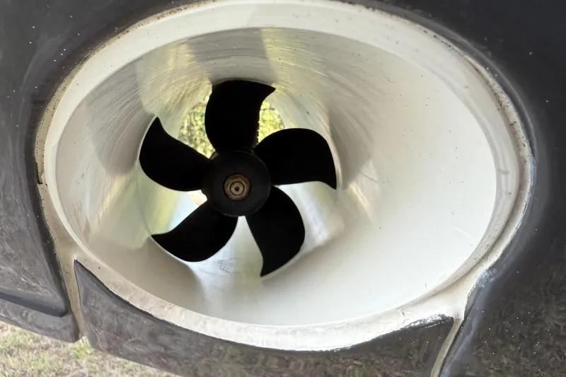 Silver Lining Yacht Photos Pics Close-up of a 2023 Pursuit DC 365 Dual Console boat propeller.