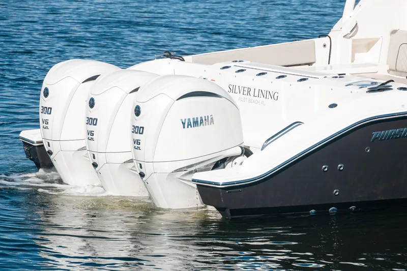 Silver Lining Yacht Photos Pics 2023 Pursuit DC 365 Dual Console with triple Yamaha 300 V6 engines on water.