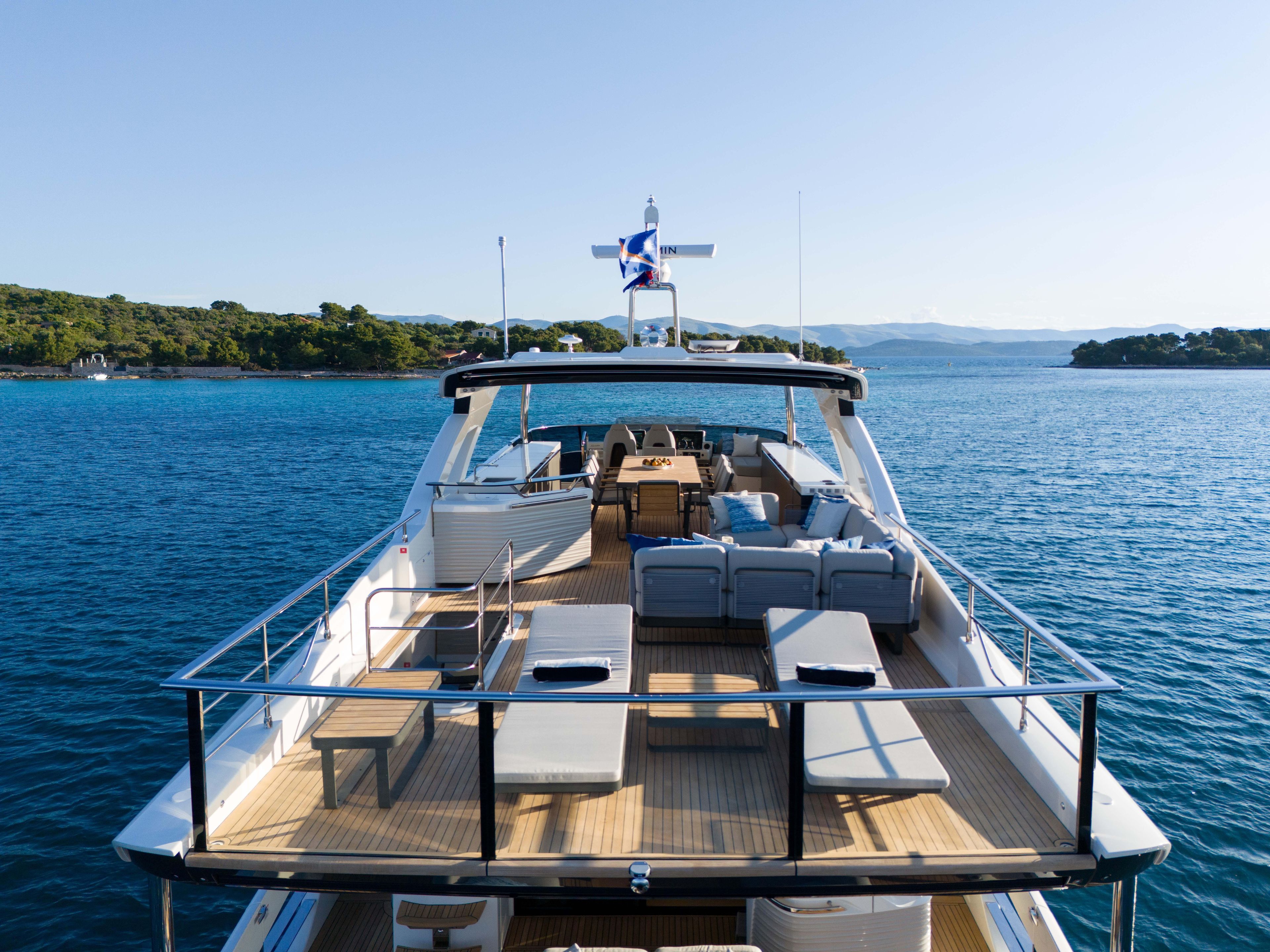 Luxurious 2026 Absolute Navetta Co Ownership yacht on serene blue waters.