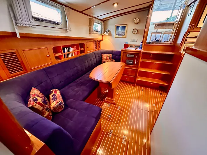 Moonshadow Yacht Photos Pics Luxurious 2004 Grand Banks 49 Eastbay HX yacht interior with plush seating and elegant wood finishes.