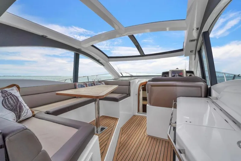 Empire Yacht Photos Pics Luxurious interior of 2017 Galeon 445 HTS yacht with panoramic windows and elegant seating.