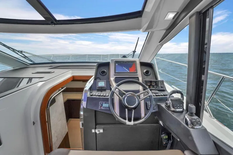 Empire Yacht Photos Pics Helm of 2017 Galeon 445 HTS yacht with modern navigation equipment.