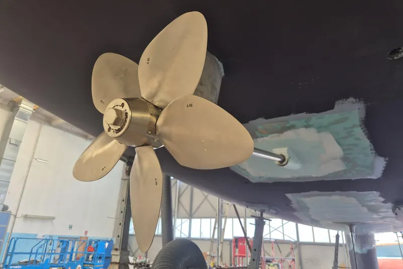 4961 Yacht Photos Pics Propeller of 2000 Nautor Swan 60 yacht in maintenance facility.