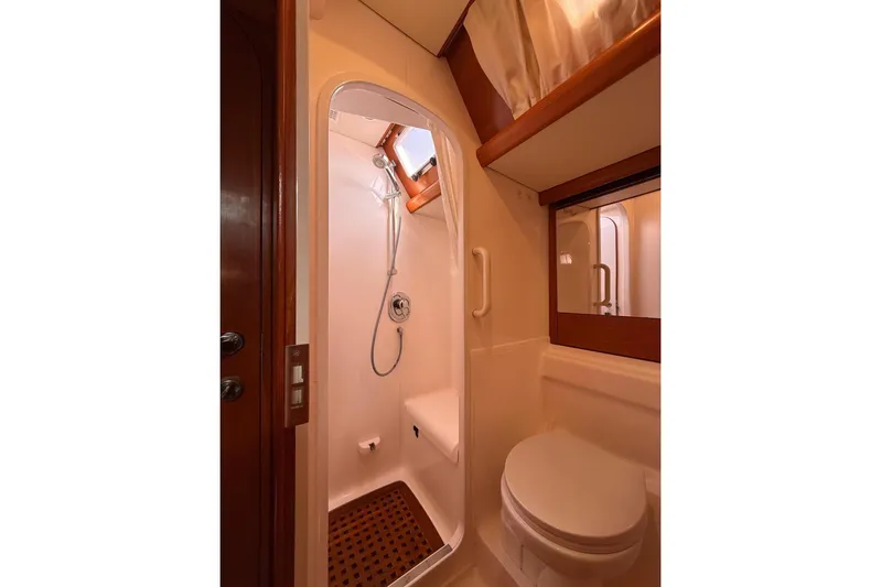 4961 Yacht Photos Pics Nautor Swan 60 yacht bathroom, featuring shower and toilet, 2000 model.