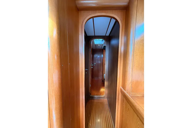 4961 Yacht Photos Pics Nautor Swan 60 yacht interior hallway with wooden paneling, 2000 model.