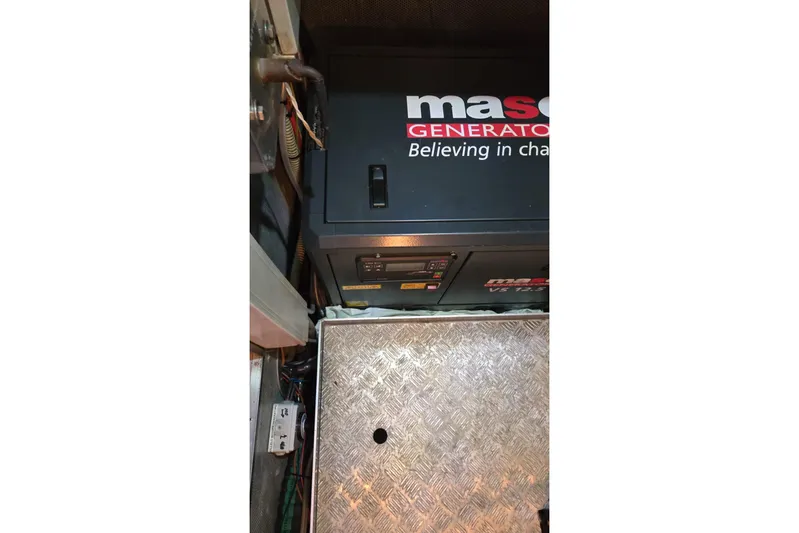 4961 Yacht Photos Pics Generator in a 2000 Nautor Swan 60 yacht engine room, featuring a Maspower unit.