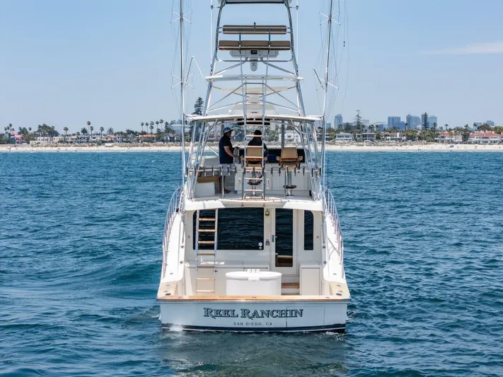 Reel Ranchin Yacht Photos Pics 2004 Hatteras 54 Convertible yacht on ocean near San Diego coast.