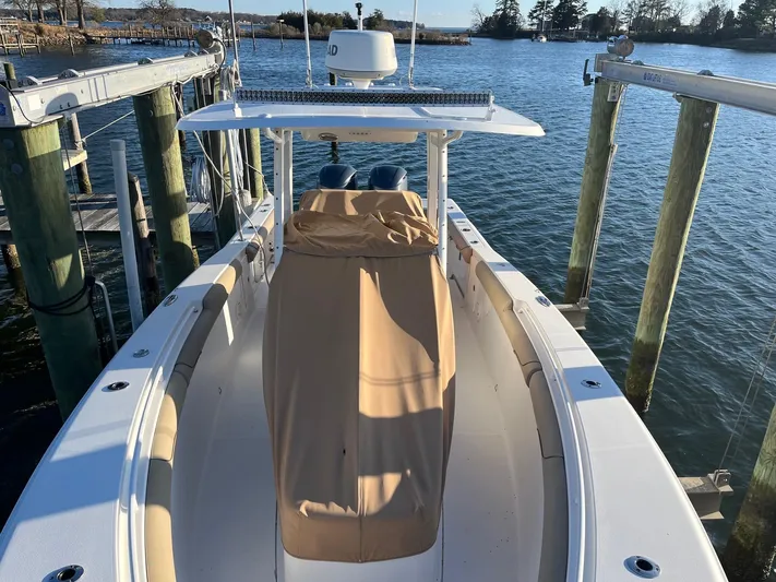 Salty Rim Yacht Photos Pics 2015 Sea Hunt Gamefish 30 with Coffin Box docked by the water.