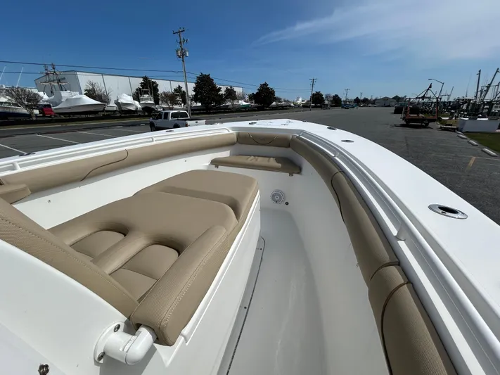Salty Rim Yacht Photos Pics 2015 Sea Hunt Gamefish 30 with Coffin Box, featuring spacious seating and sleek design.
