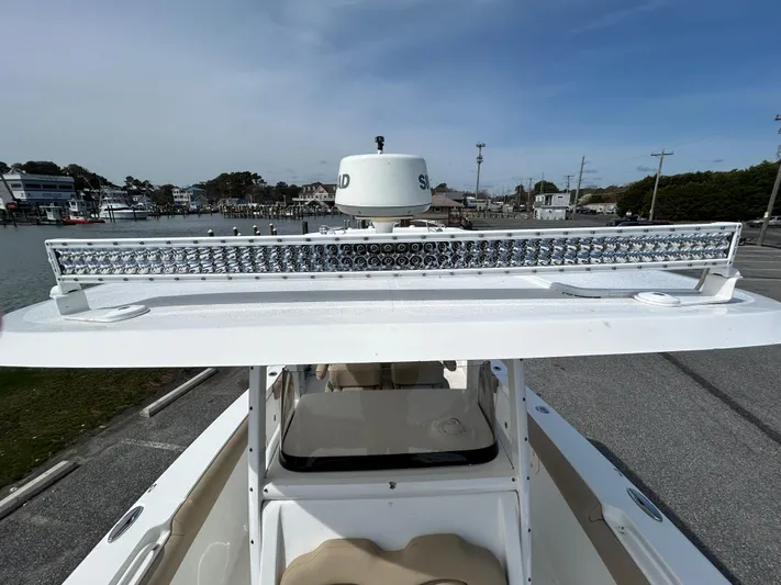 Salty Rim Yacht Photos Pics 2015 Sea Hunt Gamefish 30 with Coffin Box, featuring a rooftop light bar.