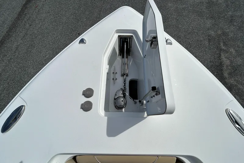 Salty Rim Yacht Photos Pics 2015 Sea Hunt Gamefish 30 bow with open storage compartment.