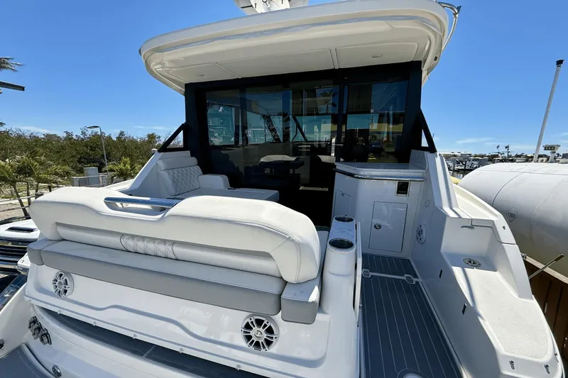  Yacht Photos Pics 2023 Regal 36 XO yacht with luxurious seating and sleek design.