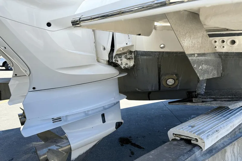  Yacht Photos Pics 2023 Regal 36 XO boat stern with outboard motor and propeller detail.