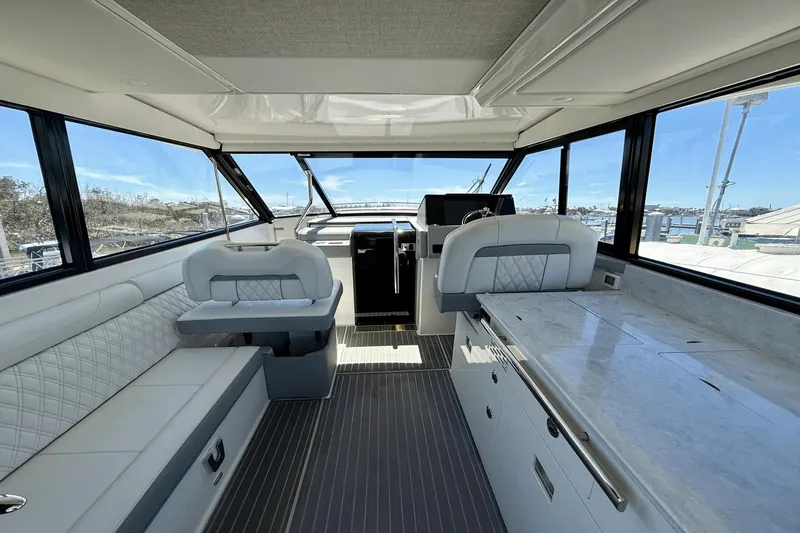  Yacht Photos Pics Interior of 2023 Regal 36 XO yacht with luxurious seating and modern design.