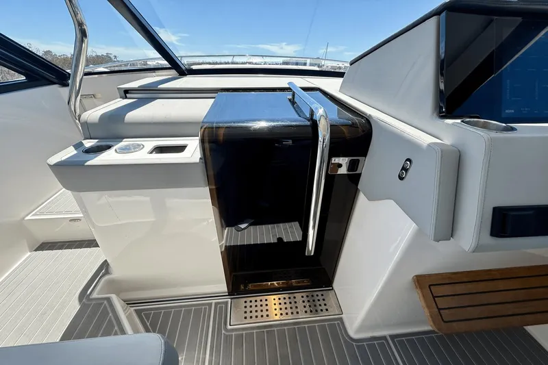  Yacht Photos Pics 2023 Regal 36 XO yacht interior with sleek design and modern controls.