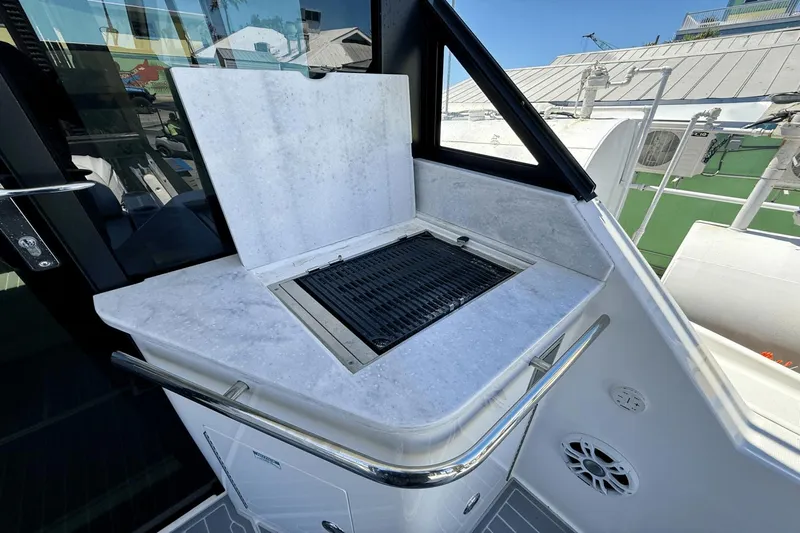  Yacht Photos Pics Outdoor grill on 2023 Regal 36 XO yacht with marble countertop.