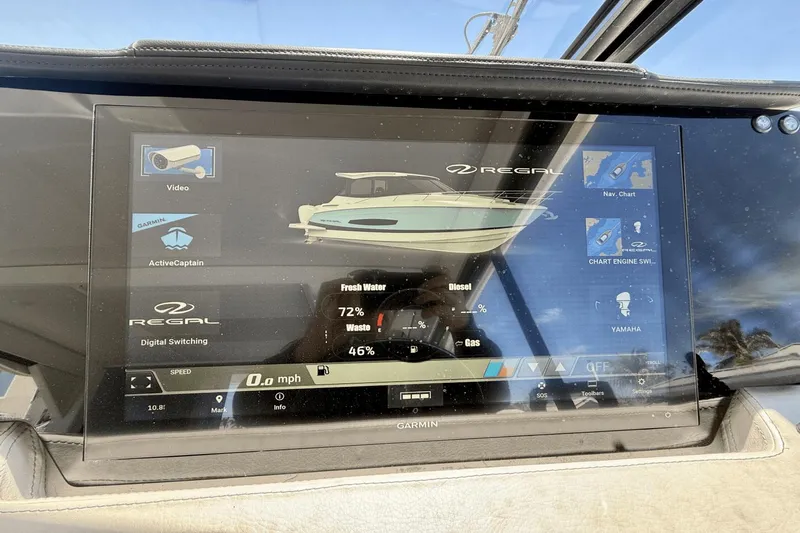  Yacht Photos Pics Touchscreen display on 2023 Regal 36 XO boat showing navigation and system controls.