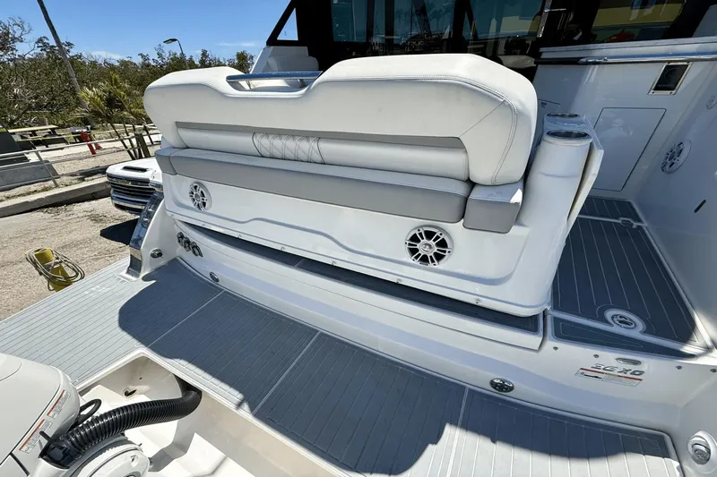  Yacht Photos Pics 2023 Regal 36 XO boat with cushioned seating and integrated speakers on deck.