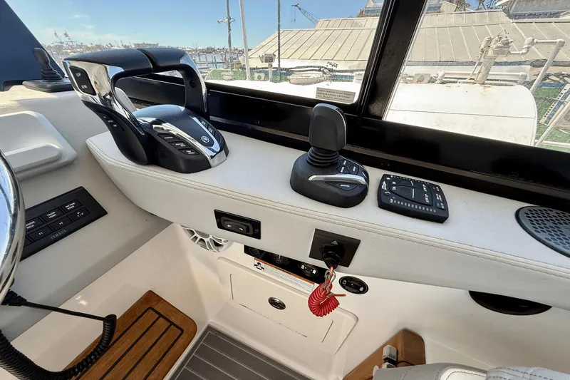  Yacht Photos Pics Control panel of 2023 Regal 36 XO boat with joystick and throttle levers.
