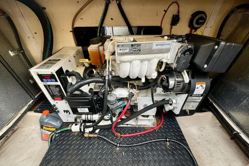  Yacht Photos Pics Engine room of a 2006 Silverton 38 Sport Bridge with Kohler generator and Prestone antifreeze.