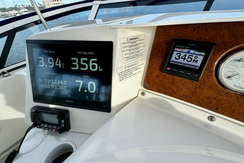  Yacht Photos Pics 2006 Silverton 38 Sport Bridge dashboard with GPS display and navigation instruments.