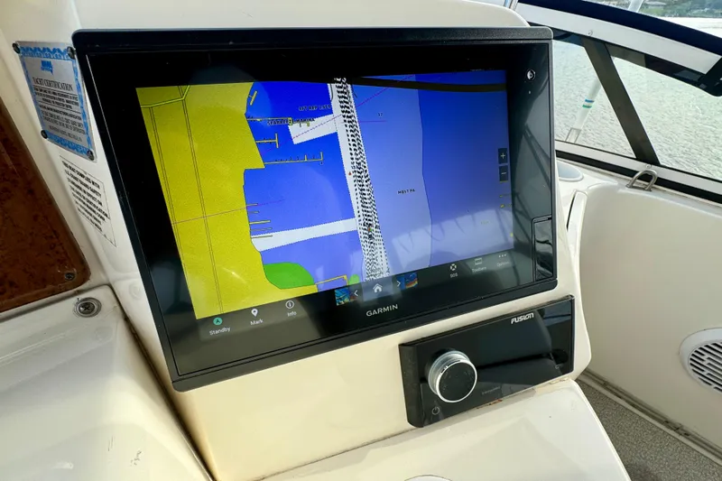  Yacht Photos Pics Garmin navigation display on 2006 Silverton 38 Sport Bridge yacht dashboard.