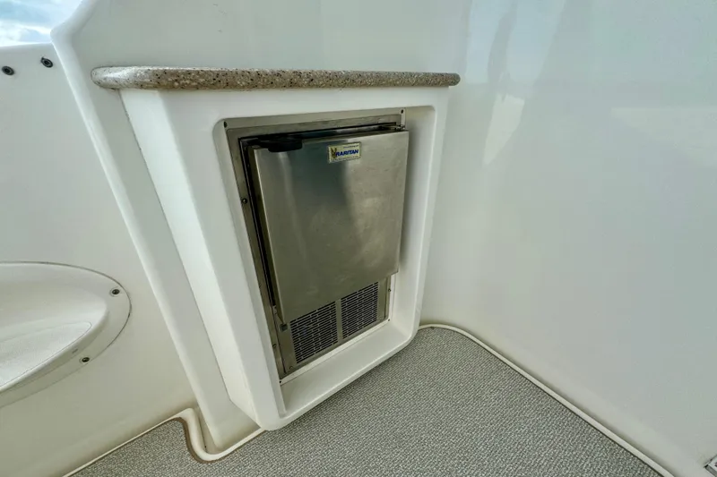  Yacht Photos Pics Built-in mini fridge on 2006 Silverton 38 Sport Bridge yacht, featuring sleek design and compact storage.