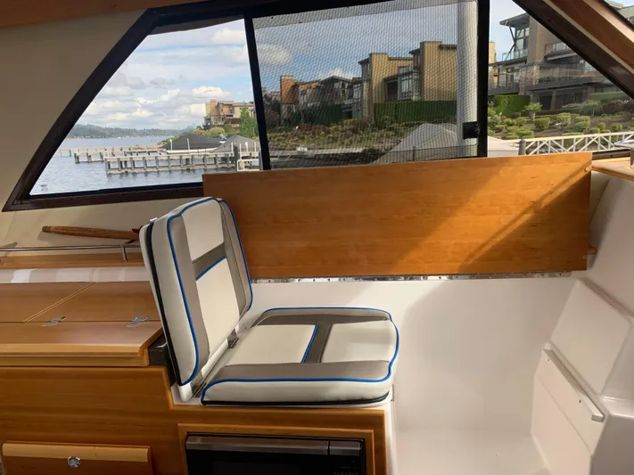  Yacht Photos Pics Interior of 2018 Cutwater C-302 Coupe with scenic waterfront view.