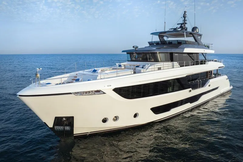  Yacht Photos Pics Luxurious 2027 Majesty 112 Terrace yacht cruising on open sea under clear sky.