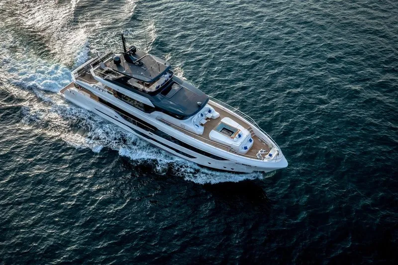  Yacht Photos Pics Luxurious 2027 Majesty 112 Terrace yacht cruising on open sea waters.