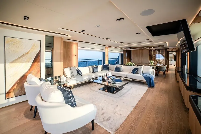  Yacht Photos Pics Luxurious interior of 2027 Majesty 112 Terrace yacht with elegant seating and ocean view.