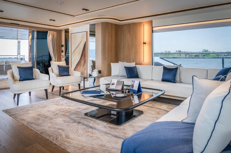  Yacht Photos Pics Luxurious interior of 2027 Majesty 112 Terrace yacht with elegant seating and ocean view.