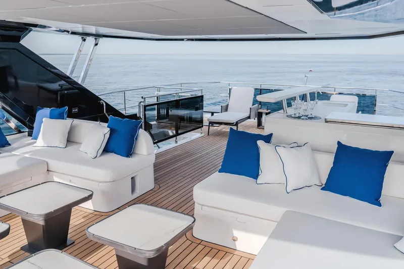  Yacht Photos Pics Luxurious 2027 Majesty 112 Terrace yacht deck with elegant seating and ocean view.