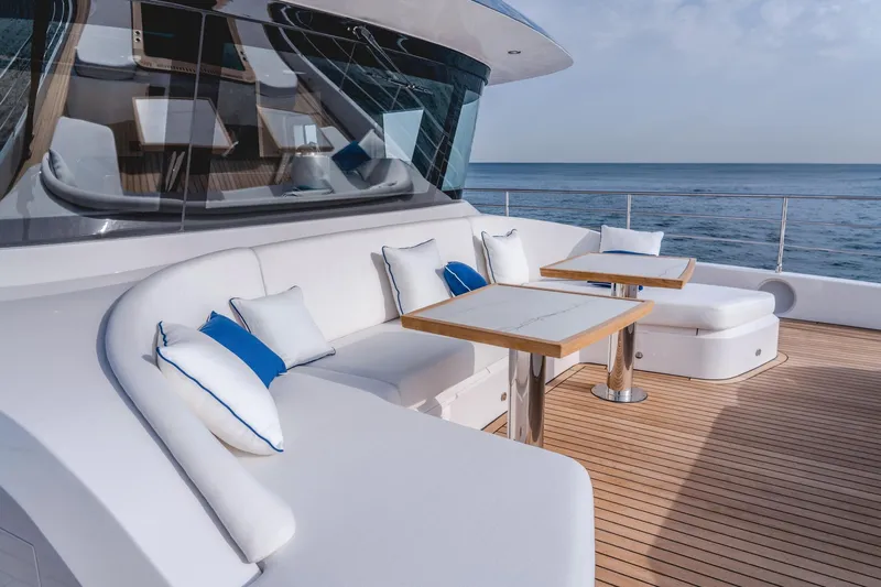  Yacht Photos Pics Luxurious seating area on 2027 Majesty 112 Terrace yacht with ocean view.