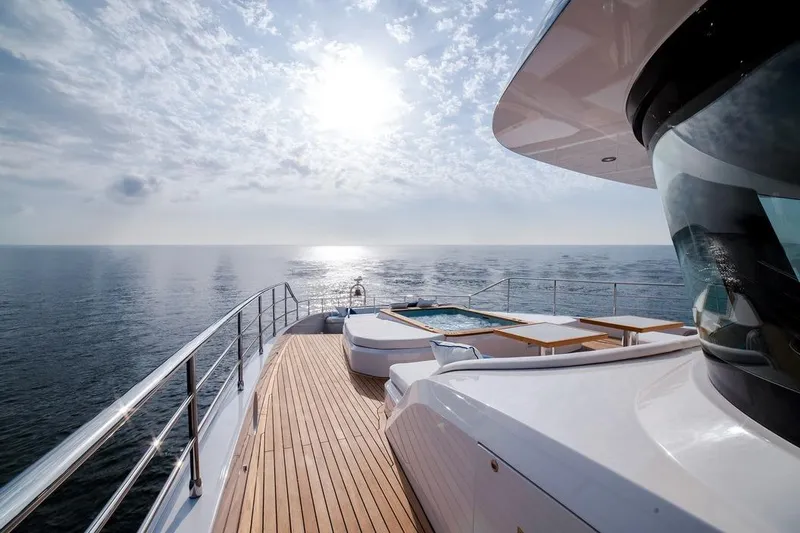  Yacht Photos Pics Luxurious 2027 Majesty 112 Terrace yacht deck with ocean view and jacuzzi.