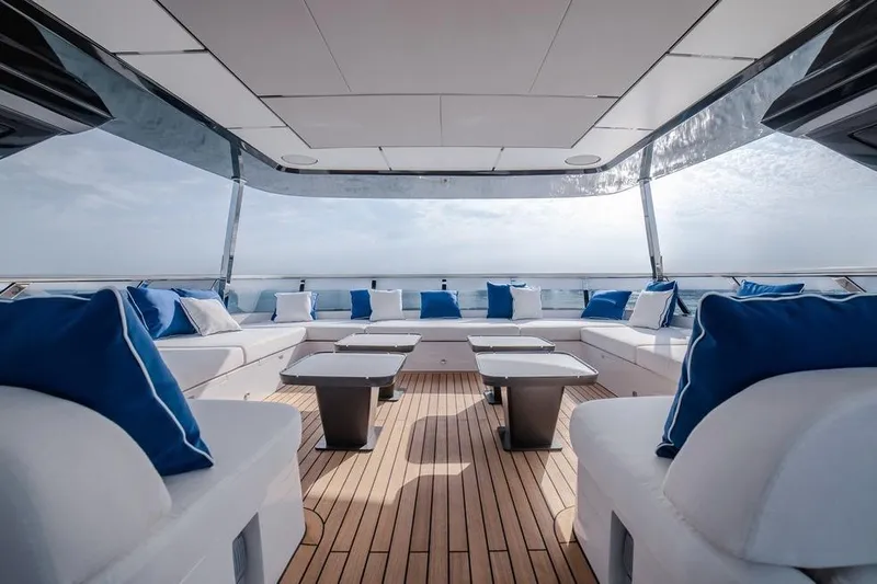  Yacht Photos Pics Luxurious 2027 Majesty 112 Terrace yacht deck with elegant seating and ocean view.