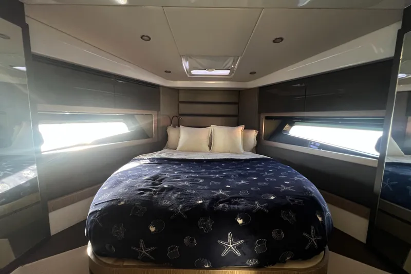  Yacht Photos Pics Luxurious 2018 Azimut Atlantis 43 yacht bedroom with elegant bedding and modern design.