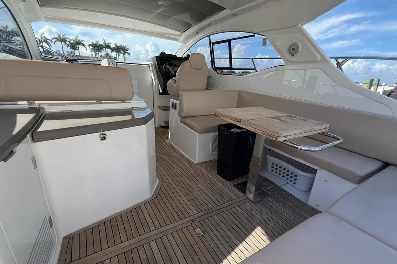  Yacht Photos Pics 2018 Azimut Atlantis 43 yacht interior with seating and table, featuring modern design.