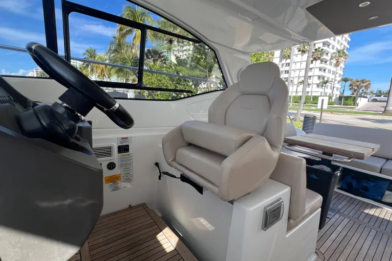 Yacht Photos Pics Interior of 2018 Azimut Atlantis 43 yacht, featuring helm seat and modern design.