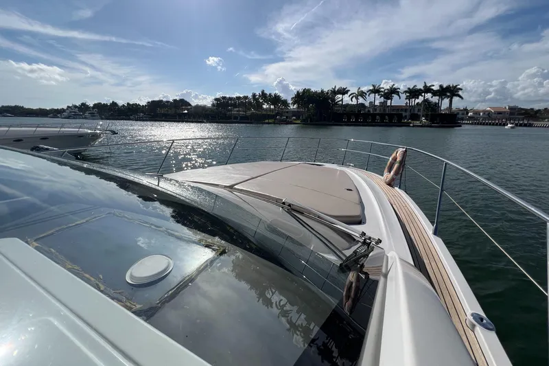  Yacht Photos Pics Azimut Atlantis 43 yacht, 2018 model, cruising on a sunny day with scenic waterfront views.