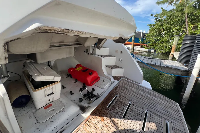  Yacht Photos Pics 2018 Azimut Atlantis 43 yacht stern with storage area and dock view.