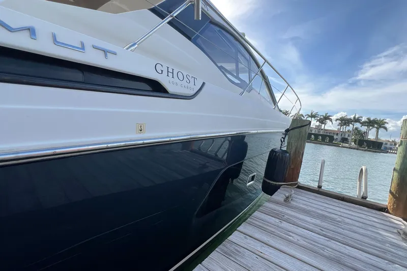  Yacht Photos Pics Azimut Atlantis 43 yacht docked, side view, 2018 model, sunny day, waterfront setting.
