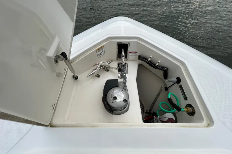  Yacht Photos Pics 2017 Boston Whaler 370 Outrage anchor locker with equipment and storage.