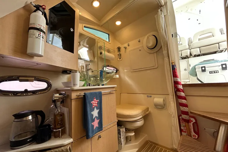  Yacht Photos Pics 2017 Boston Whaler 370 Outrage cabin with modern amenities and stylish interior design.