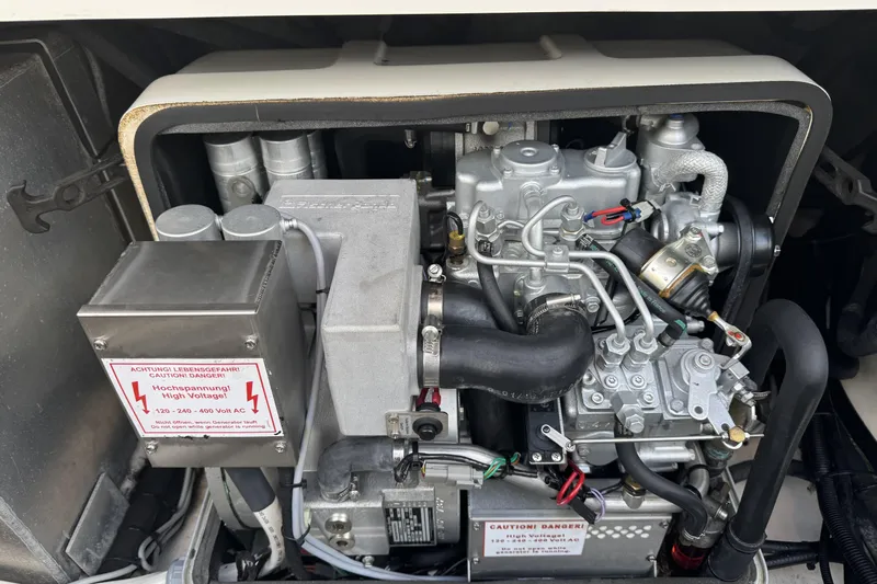  Yacht Photos Pics Engine compartment of a 2017 Boston Whaler 370 Outrage with high voltage warning.