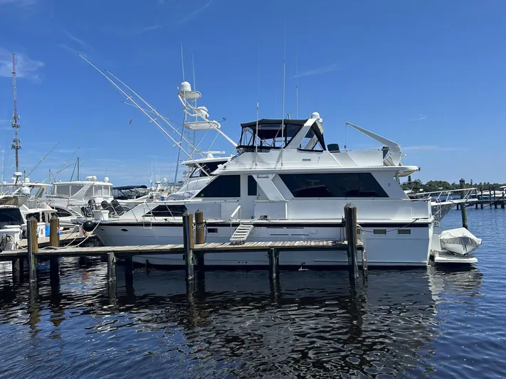 Esmeralda Yacht Photos Pics 1988 Jefferson Marquessa 52 yacht docked at marina under clear blue sky.
